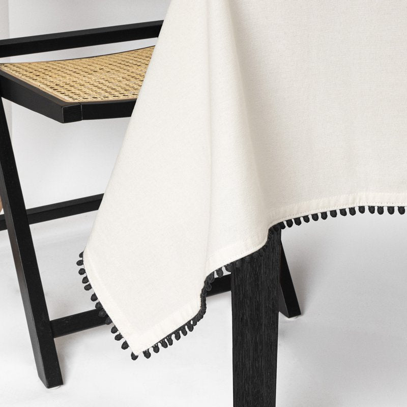 84" Ivory Tablecloth with Black Pom Pom Trim - Single
