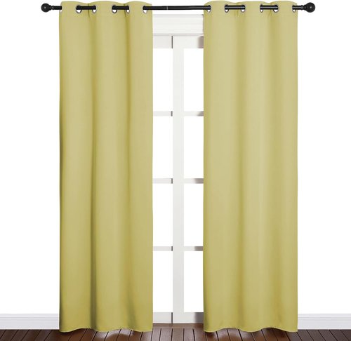 NICETOWN Blackout Curtain Panels - Thermal Insulated Grommet Drapes for Basement | Pale Yellow, 34"x84" (1 Pair)