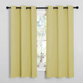 NICETOWN Blackout Window Curtain Panels - Thermal Insulated Grommet Drapes | Paler Yellow, 34x54 Inches (1 Pair)
