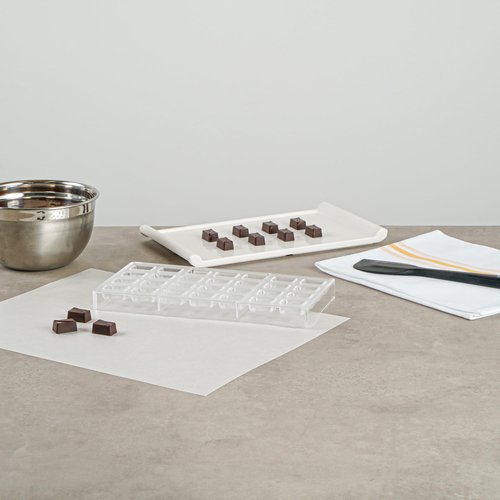 Restaurantware Pastry Tek 10.8 x 5.3 Inch Chocolate Shaping Molds 10 Freezable Candy Molds - 28 Cavities Wave Design Clear Polycarbonate Chocolate Molds Dishwashable Easy To Release