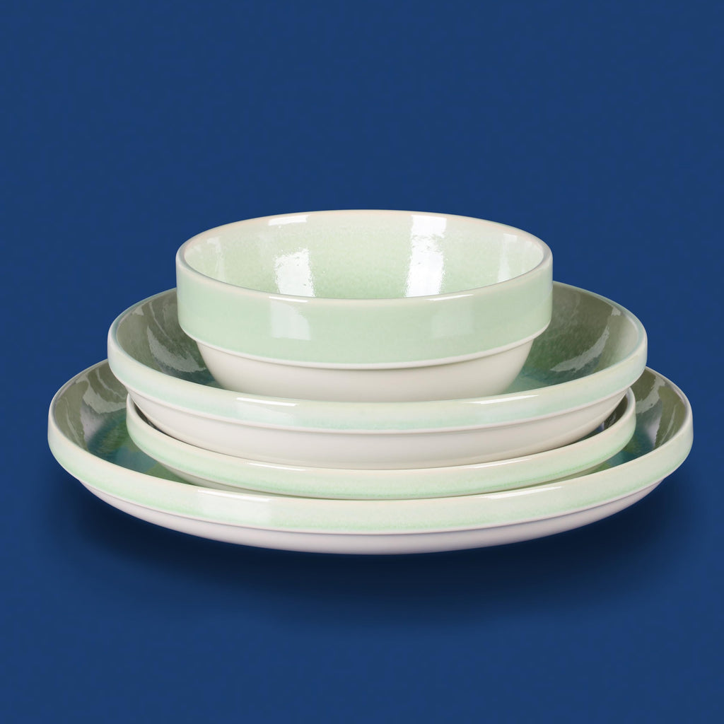 Sur La Table Kitchen Essentials Banquette 16 Piece Double Bowl Plates and Bowls Reactive Glaze Stoneware Dinnerware Set - Green