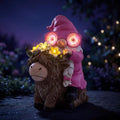 iStatue Solar Highland Cow Garden Statue - Animated LED Goggles, 8.7" Pink Resin Gnome with Moving Eyes