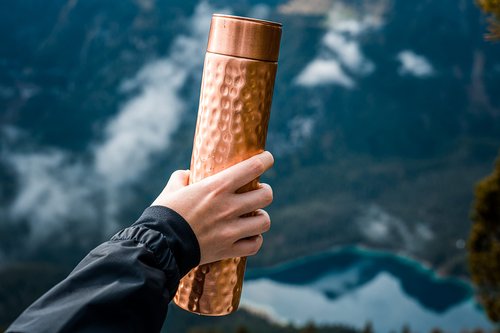 Copper Water Bottle - 34oz Hammered Vintage Modern Design - A Handcrafted Ayurvedic Pure Copper Vessel For Drinking - Drink More Water, Lower Your Sugar Intake And Enjoy The Health Benefits
