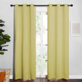 NICETOWN Blackout Curtain Panels - Thermal Insulated Grommet Drapes for Basement | Pale Yellow, 34"x84" (1 Pair)