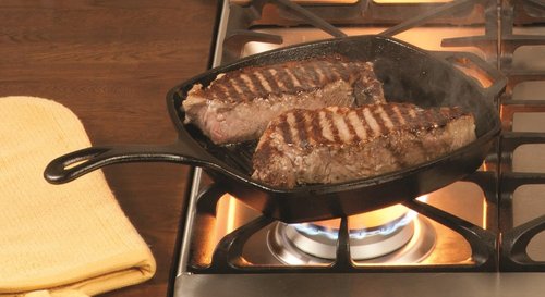 Lodge Square Cast Iron Grill Pan - Pre-Seasoned Skillet for Perfectly Grilled Burgers - 10.5 Inches
