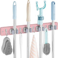 OUTNILI Pink Mop Broom Holder - Wall Mount Organizer with 4 Slots & Hooks for Kitchen & Laundry Room Decor