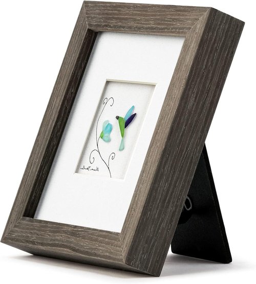 DEMDACO Tiny Moments of Wonder Wall Art by Sharon Nowlan - Hummingbird & Flower Framed Wall Art Made with a Composite Pebbles Mix - Easel Back Frame - Triangle-Style Hanger - Wood Frame