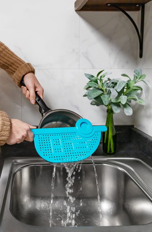 Camco Life is Better at The Campsite RV-Shaped Pot Drainer | Features a Handle for Safe and Easy Draining, an Easy-to-Clean Durable Teal Design, and is Dishwasher Safe (53385)