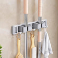 Skiennix Mop and Broom Holder - Adjustable Wall Mount Tool Organizer Rack with Sliding Hooks | Heavy Duty, Drill-Free Storage for Kitchen, Garage & Laundry Room