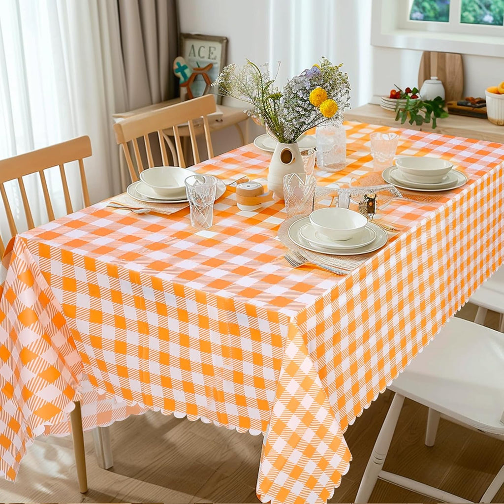 Skiennix 12 Pack Orange Gingham Tablecloths - 54" x 108" Waterproof Disposable Checkered Covers for Parties