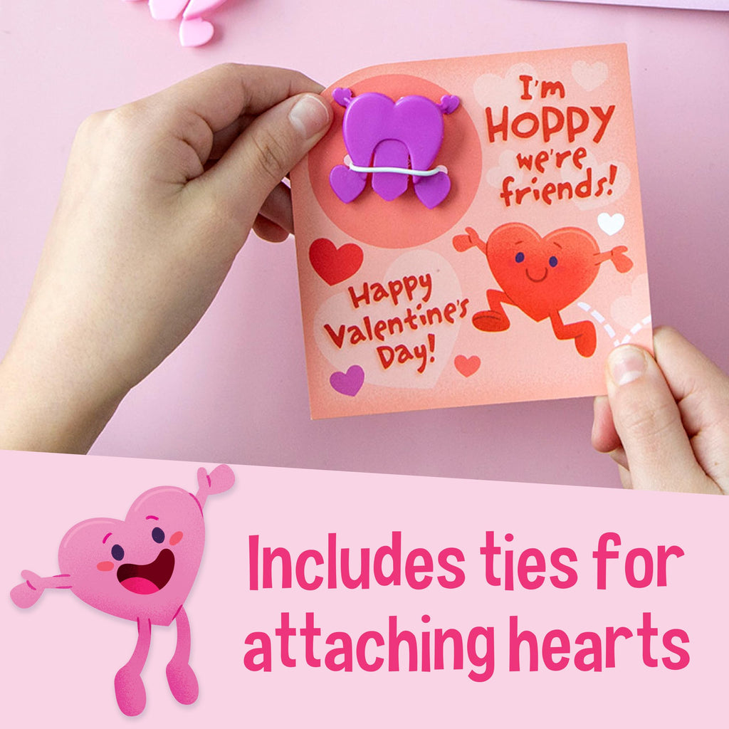 Peaceable Kingdom Valentine's Day Gift for Kids, Fun Party Favors for Classroom, Goodie Bag Stuffers - 28 Hopping Hearts Valentines