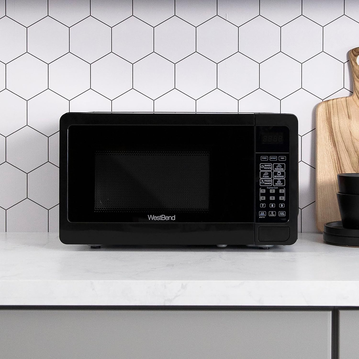 West Bend Microwave Oven - 700-Watt Compact Design with 6 Pre-Set Cooking Settings | 0.7 Cu.Ft., Black