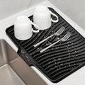 TIKNIK Silicone Dish Drying Mat, Stone Drying Mat for Kitchen Counter with Built-In Drain, Non-Slip Drain Pad with Built-in Drain, Heat Resistant Stone Drying Mat, Hangable, Black-1pc, 20" x 15"