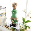 Deco 79 Small Hand-Crafted Pine Wood, Cowrie Shells, Green Beads & Kente Cloth African Woman Namji Doll, 3" x 5"