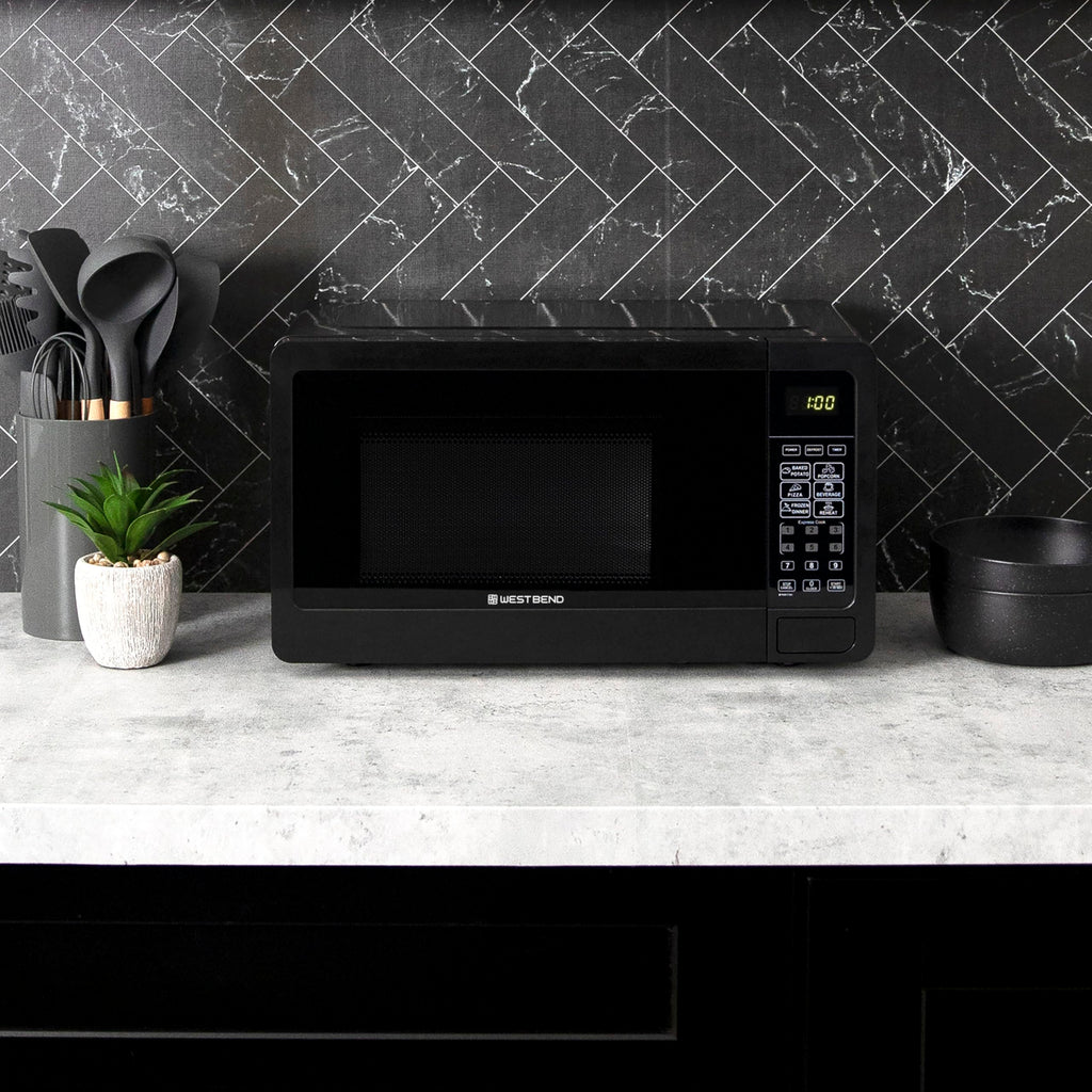 West Bend Microwave Oven 700-Watts Compact with 6 Pre-Set Cooking Settings, Speed Defrost, Electronic Control Panel and Glass Turntable, 0.7 Cu.Ft., Black