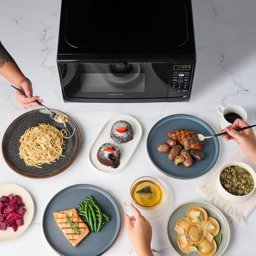 Farberware 0.7 Cu. Ft. Microwave Oven - 700 Watts, Auto Cook, Defrost & Easy Clean - Black Finish