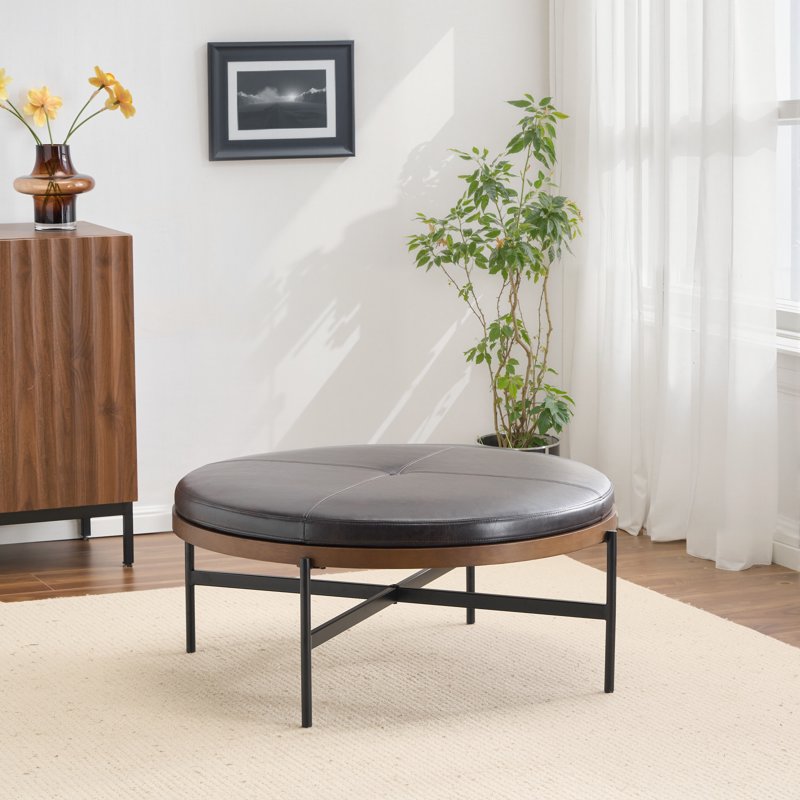 Industrial 36-Inch Round Cocktail Ottoman - Button Tufted Black